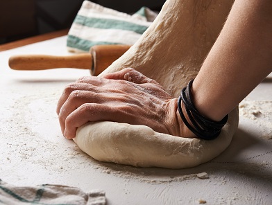 Pulling Almond Flour Doughball for Keto Raviolis Recipe